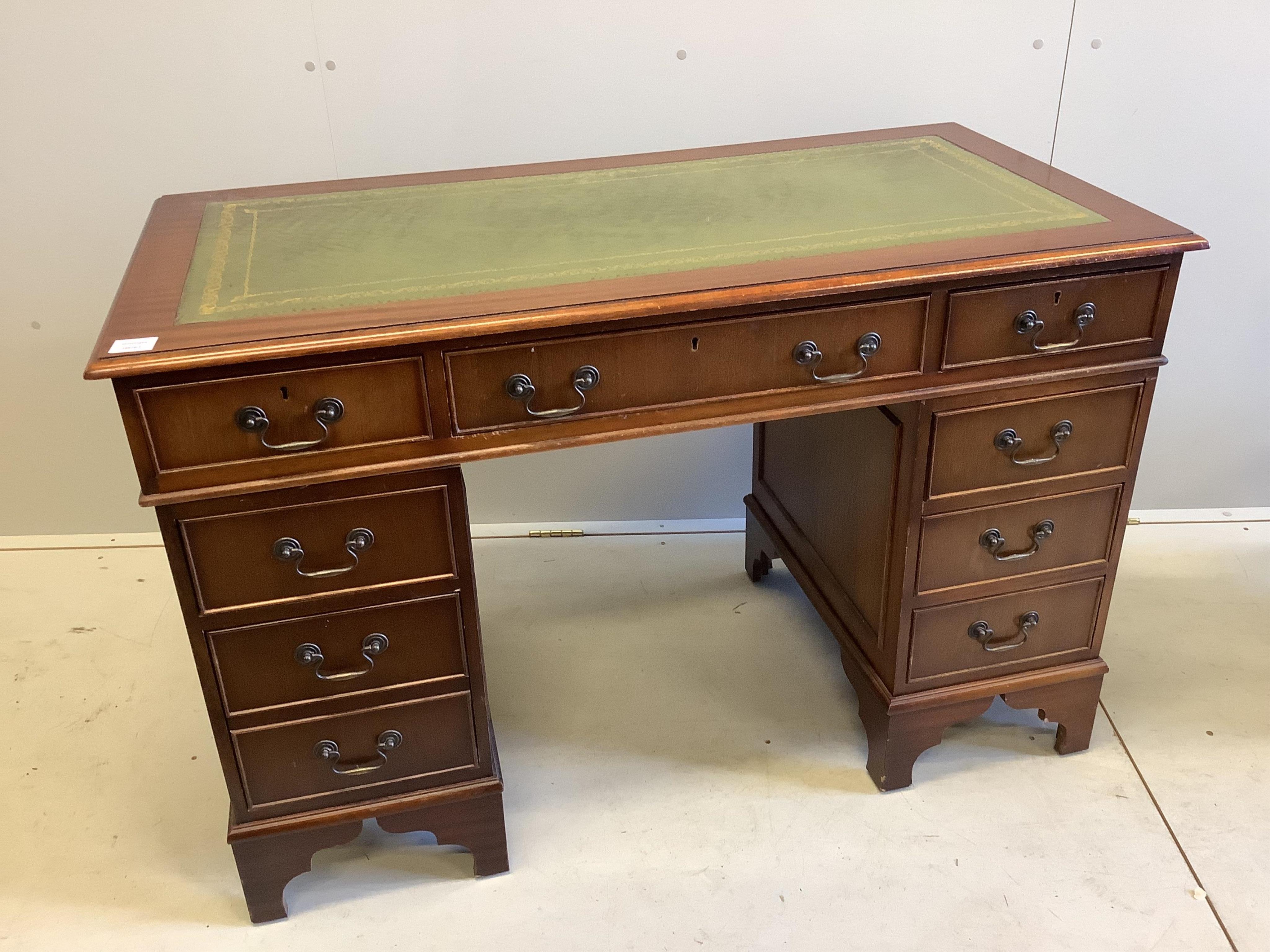 A George III style mahogany pedestal desk, width 122cm, depth 60cm, height 79cm. Condition - good